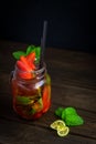 Home-made Mojito with strawberries in a glass jar Royalty Free Stock Photo