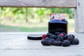 Home made mulberry jam and fresh mulberry on wood background, Healthy eating and very useful