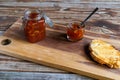 home made orange marmalade with toast on wooden board Royalty Free Stock Photo