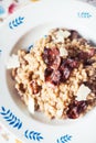 Home made orzotto with common morels and crunchy bacon