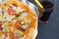 Home made pizza with soda Royalty Free Stock Photo