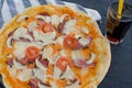 Home made pizza with soda Royalty Free Stock Photo
