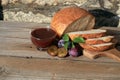 Home made plum jam and your own baking round loaf of bread.