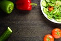 Salad vegetables: tomatoes, fresh pepper and cucumber. Concept for a tasty and healthy meal.Vitamins in vegetables and herbs for i Royalty Free Stock Photo