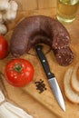 home made sausage, tomato and bread Royalty Free Stock Photo