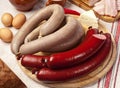 Home-made sausages on the cutting board. Royalty Free Stock Photo
