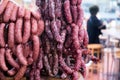 Home made smoked sausages for sale at meat market. Traditionally smoked meat on display at the market