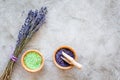 Home spa with lavender herbs cosmetic salt for bath on stone desk background top view mock-up Royalty Free Stock Photo