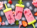 Home made strawberry ice cream popsicles