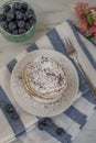 Home made lemon pancakes with poppy seeds on a breakfast table Royalty Free Stock Photo