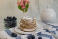 Home made lemon pancakes with poppy seeds on a breakfast table Royalty Free Stock Photo