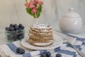 Home made lemon pancakes with poppy seeds on a breakfast table Royalty Free Stock Photo