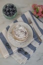 Home made lemon pancakes with poppy seeds on a breakfast table Royalty Free Stock Photo