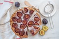 Home made sweet rustic plum cake on a table