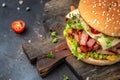 Home made tasty burger with grilled beef meat fast food and junk food concept Royalty Free Stock Photo