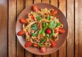 Home made vegan pasta with mushrooms, tomatoes Royalty Free Stock Photo