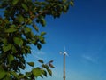 Home made  windmill   against cloudy-blue sky Royalty Free Stock Photo