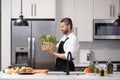 Home menu. Hispanic man cooking in kitchen. Healthy food for dinner. Man cooking home food. Healthy food, cooking Royalty Free Stock Photo