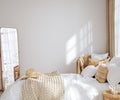 Home mockup, bedroom interior background with rattan furniture and blank wall, Coastal style Royalty Free Stock Photo