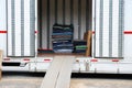 Home moving truck and stacking furniture pads