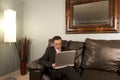 Home or Office - Businessman Working on the Couch