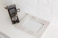 Home office concept. Empty wooden picture frame mockup. White wall background. Scandinavian interior design. Royalty Free Stock Photo