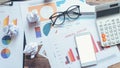 Home Office Desk Concept. Laptop, and calculator for accountant or bookkeeper plan annual budget report and tax.Computer, Crumpled Royalty Free Stock Photo