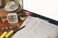 Home Office Desk Concept. Laptop, and calculator for accountant or bookkeeper plan annual budget report and tax.Computer, Crumpled Royalty Free Stock Photo