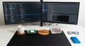 Home office desk setup with dual monitors and coding environment Royalty Free Stock Photo