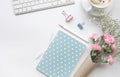 Home office desk table with notepad,flower Royalty Free Stock Photo