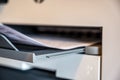 narrow focus on printer tray with paper Royalty Free Stock Photo