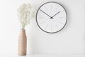 Home office minimal workspace desk with wall clock Royalty Free Stock Photo