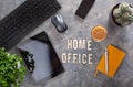 Home office text desk with keyboard computer smartphone notebook houseplants, workspace at home Royalty Free Stock Photo