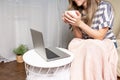 Home office woman and distance learning online education. Happy cropped beautiful lady girl working at notebook sit on