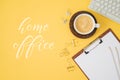 Home office and working from home concept. Table workplace with notepad, keyboard computer and coffee cup. Top view from above Royalty Free Stock Photo