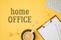 Home office and working from home concept. Table workplace with notepad, keyboard computer and coffee cup. Top view from above Royalty Free Stock Photo