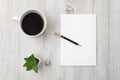 Home office workplace with cup of coffee, note pad and pen. Working from home concept. Top view - Image Royalty Free Stock Photo