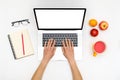 Home office workspace mockup. Laptop with blank screen, hands and accessories on white Royalty Free Stock Photo