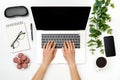 Home office workspace mockup. Laptop with blank screen, hands and accessories on white Royalty Free Stock Photo