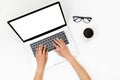 Home office workspace mockup. Laptop with blank screen, hands and accessories on white