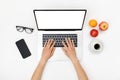 Home office workspace mockup. Laptop with blank screen, hands and accessories on white Royalty Free Stock Photo