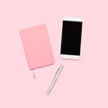 Home office workspace. Notebook with copyspace. Flat lay, magazines, social media. Top view Beauty blog concept. Royalty Free Stock Photo