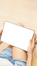 Young person sitting with tablet. White mock up Royalty Free Stock Photo