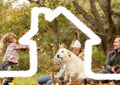 Home outline with family having fun in background Royalty Free Stock Photo
