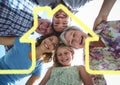 Home outline with multi generation family standing in background Royalty Free Stock Photo