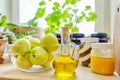 Home pantry, plants in pots, honey, chocolate paste, apples, bottle of olive oil Royalty Free Stock Photo