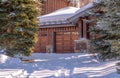 Home in Park City Utah with view of the garage entrance against snow in winter Royalty Free Stock Photo