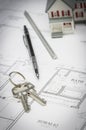 Home, Pencil, Ruler and Keys Resting On House Plans Royalty Free Stock Photo