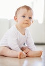 Home, playing and young baby on floor to relax, resting and calm in nursery learning to crawl in morning. Family, youth Royalty Free Stock Photo