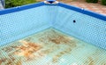 Home pool with contaminated water. Cleaning the pool from iron and rust. Royalty Free Stock Photo